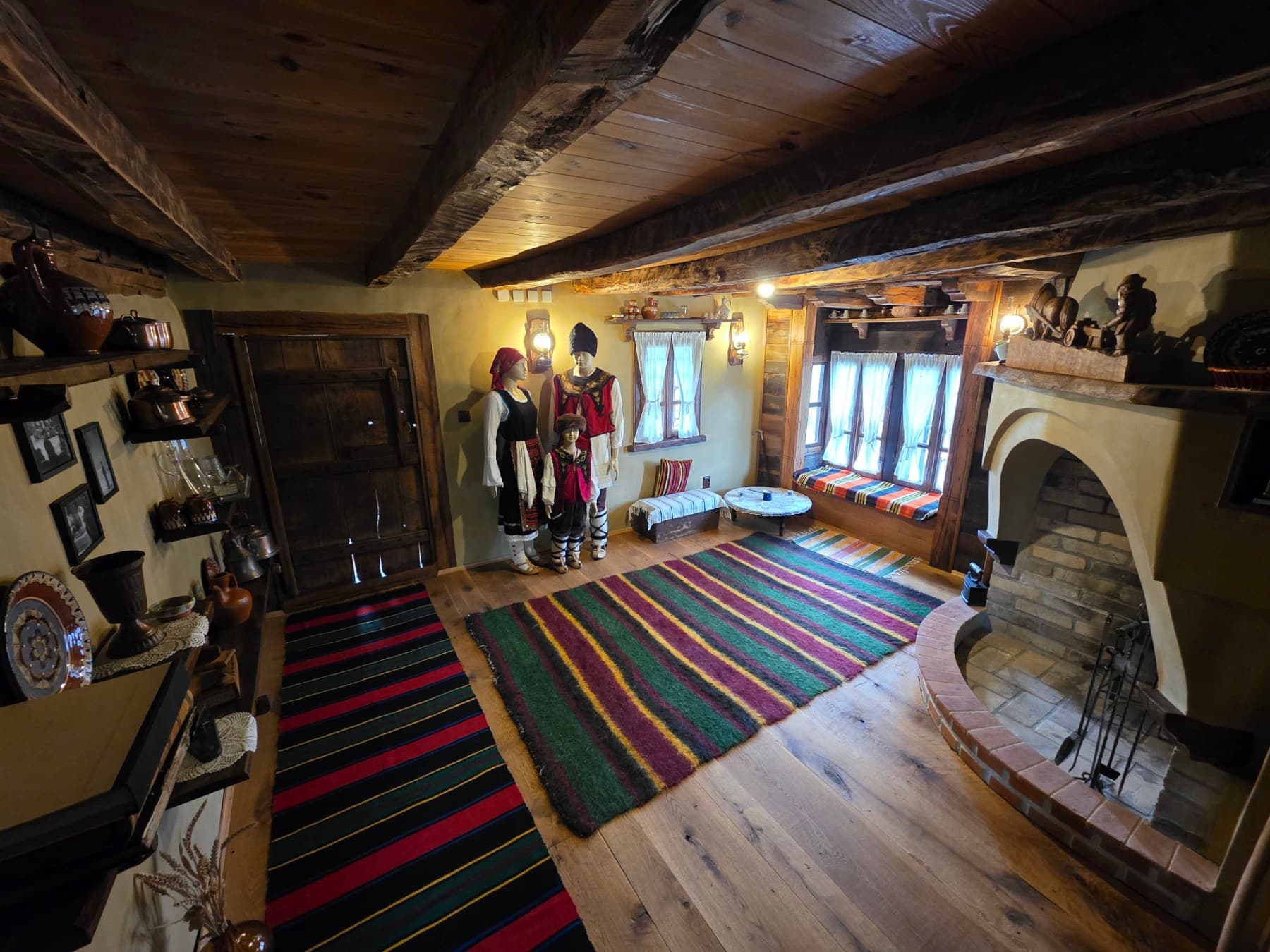 Traditional costumes displayed inside the house